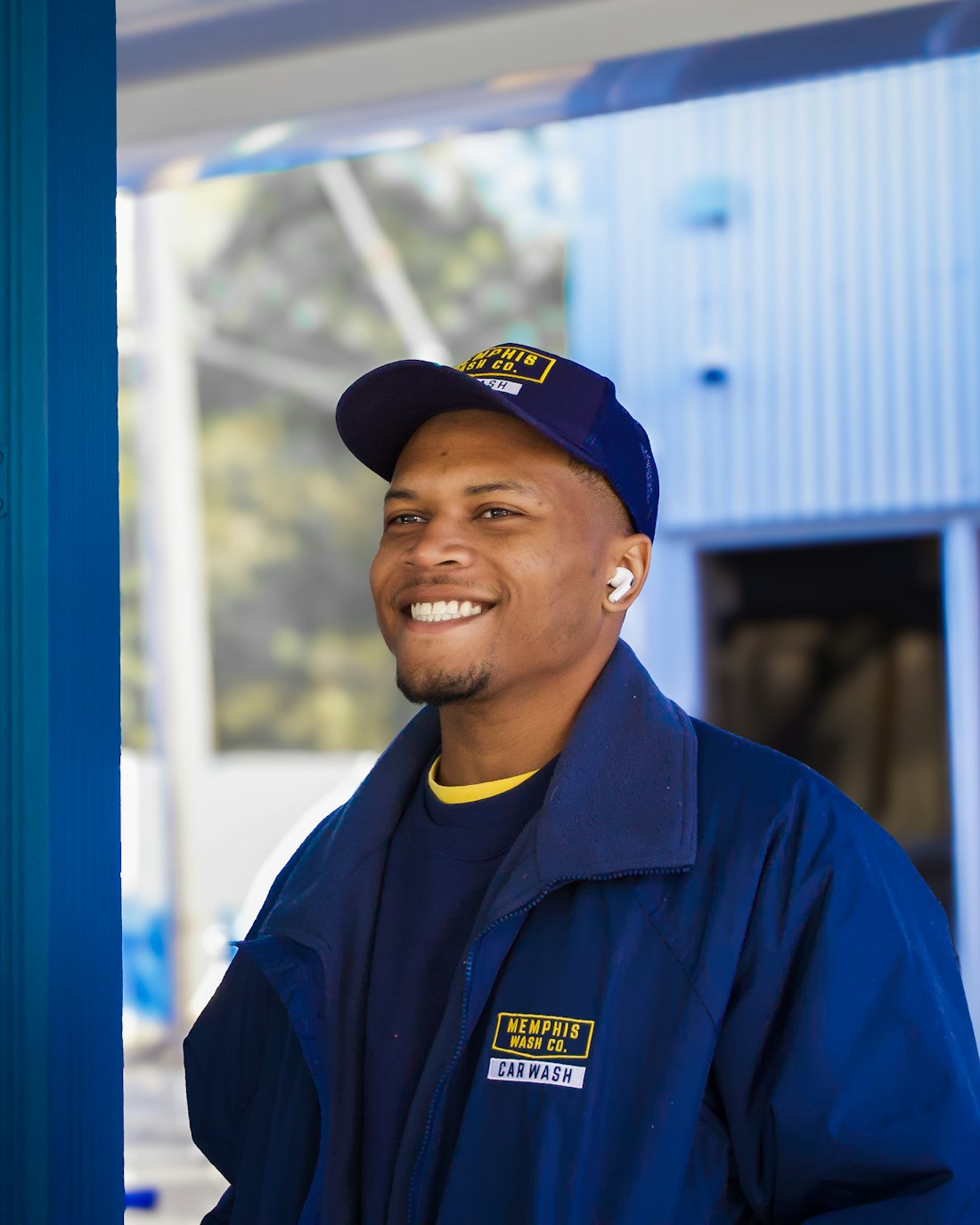 Friendly service technician in a navy uniform