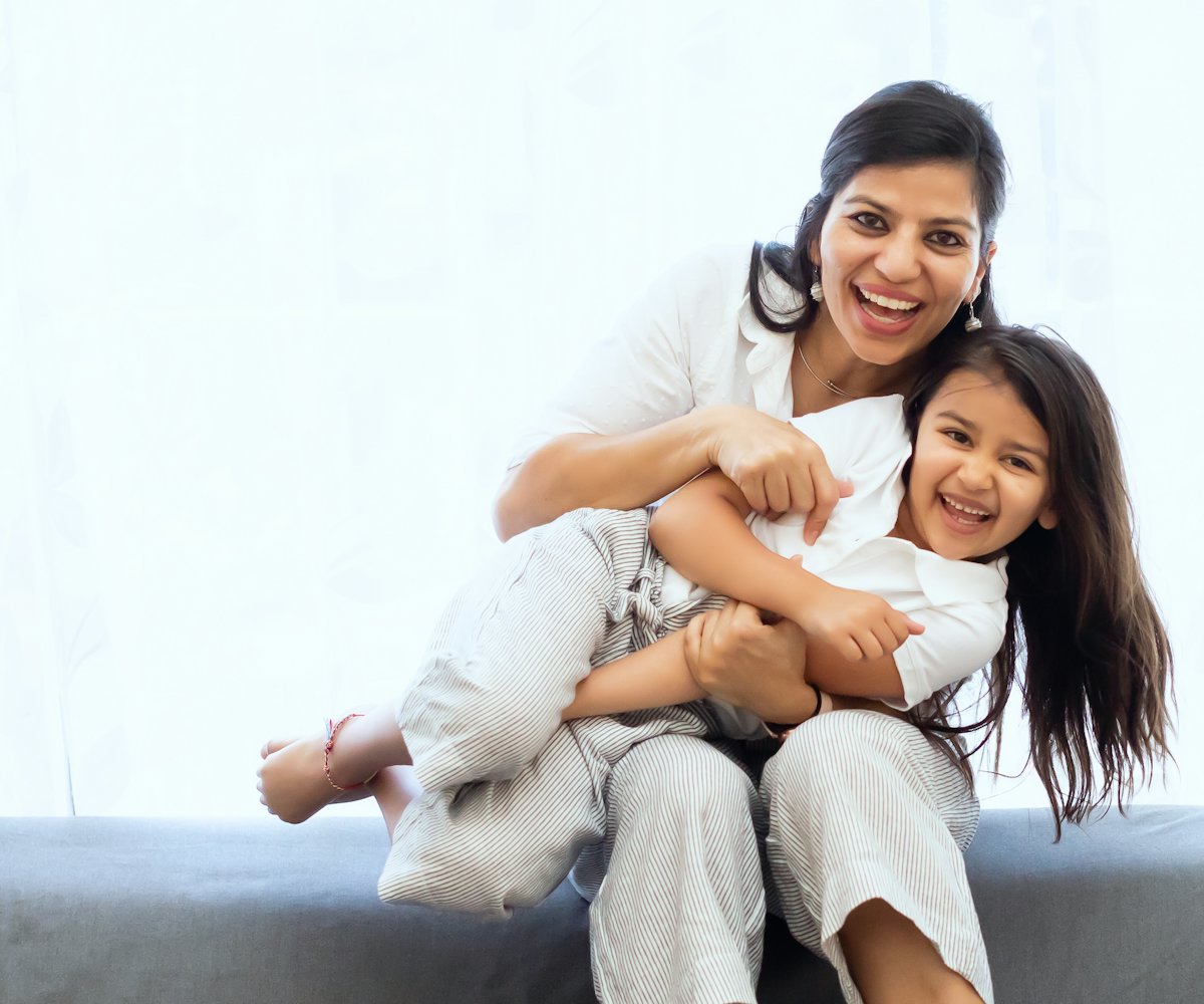 Parent and child relaxing together at home